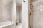 Primary bathroom with separate soaking tub 